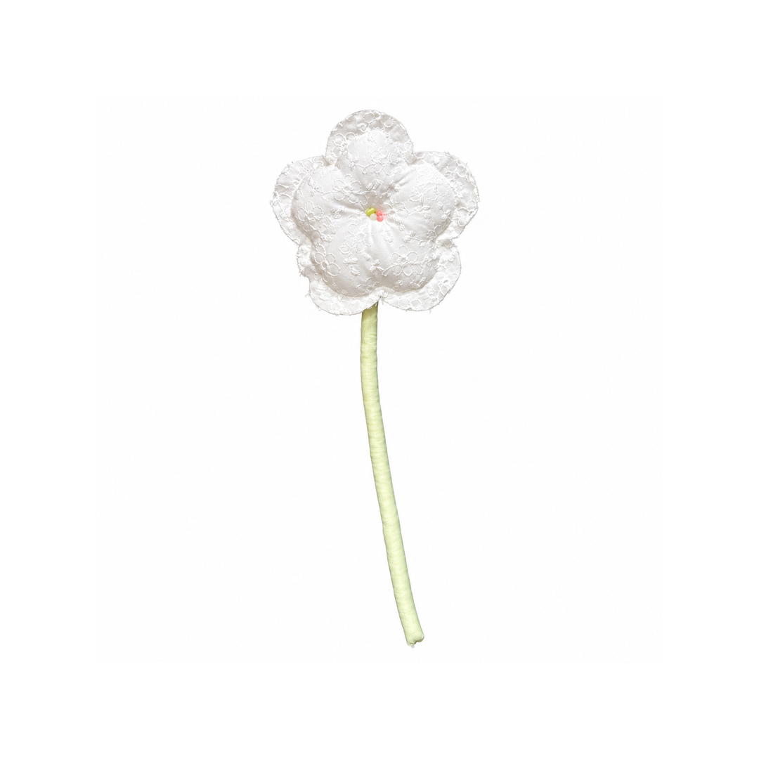 Handmade white lace bloom fabric flower stem on white background