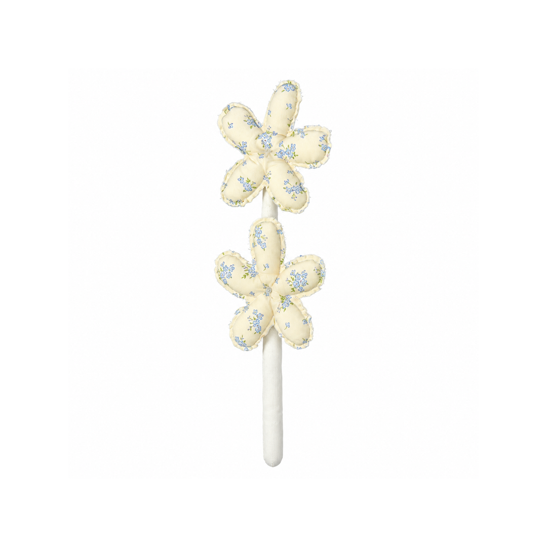 Handmade blue floral double bloom fabric flower stem on white background