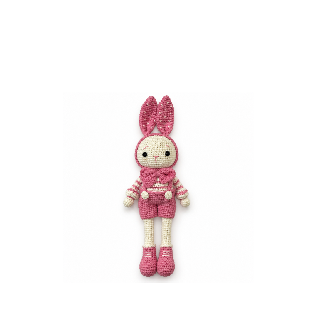Pink crochet bunny, full front view on a white background