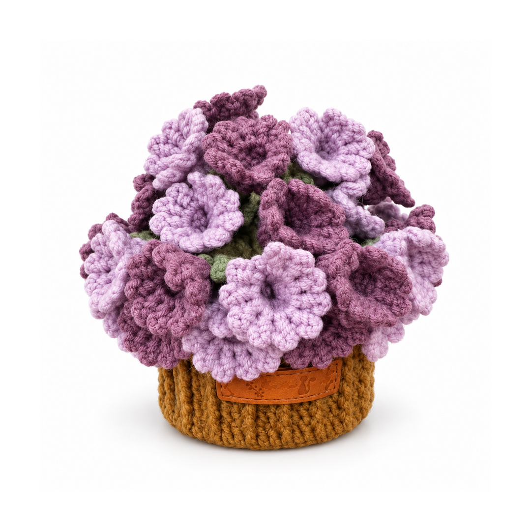 Purple flower coaster set folded into its brown pot on a white background